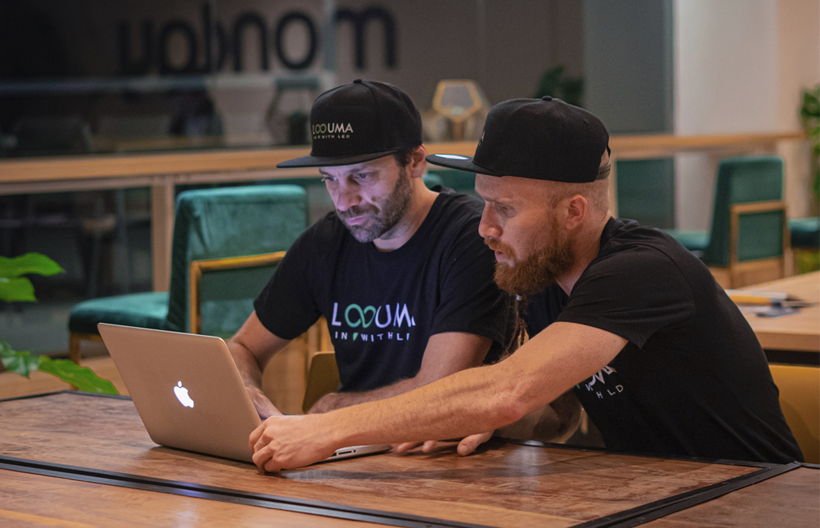 Two people working together. Loouma team! Coworkers